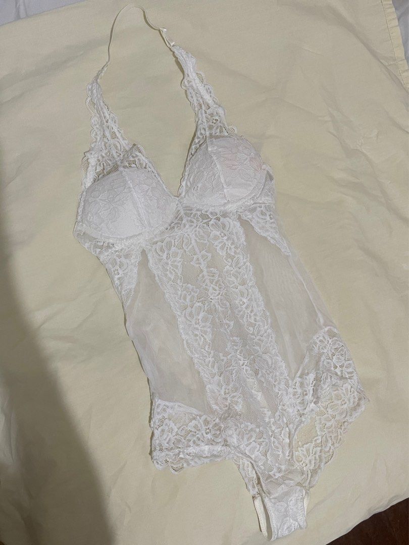 H&M Padded Sexy Lace Bodysuit Lingerie (Category: Undergarments & Loungewear) located in Quezon City. Submitted by declutter_qc (Listing ID 1356160296, Image 1). Description: Used only once! Washed thoroughly already. Has a small light pink stain on the left pad side and abdomen part; see last 2 pics..