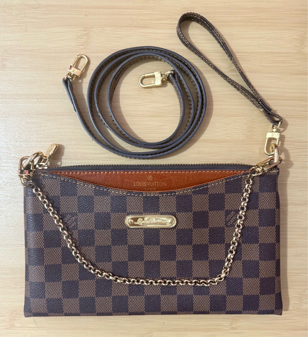 LV 4 - Way - Clutch, Shoulder , Wristlet & Sling Bag (Category: Luxury Bags & Wallets) located in Binan City. Submitted by sunnysprelovedcollection (Listing ID 1356123745, Image 1). Description: LV 4 Way Bag Can use as Clutch, Wristlet, Shoulder Bag & Sling Bag Like New Pristine Condition Can send more pictures upon request for sure buyer P4,500 only Padala from US Last price posted .