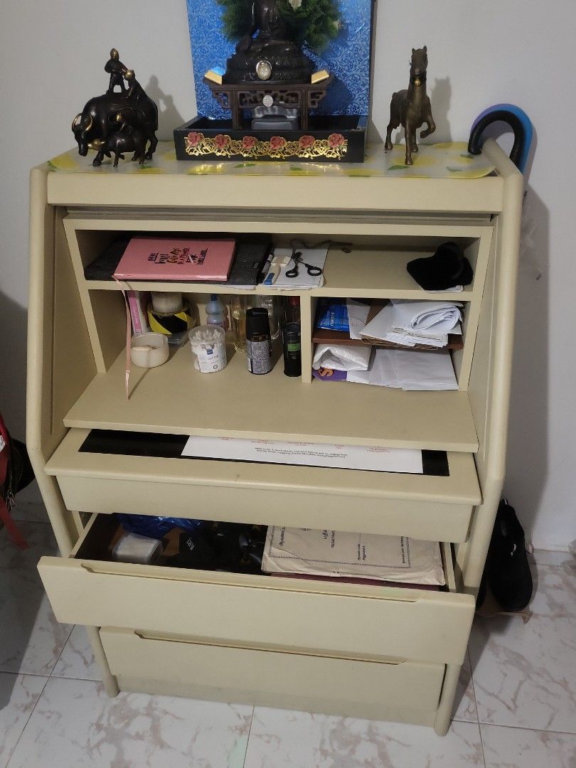 Multipurpose Table (Category: Shelves, Cabinets & Racks) located in Singapore. Submitted by centrism (Listing ID 1356186868, Image 1). Description: Sturdy Wooden Study/Multi-Purpose Table Selling a traditional wooden study/multi-purpose table with multiple racks. Heavy and spacious, perfect for storage. 🛠 Condition: Some wear & tear; a pull-out drawer is stuck due to long disuse—may need minor servicing. 📏 Features: Strong, durable wood, ample 