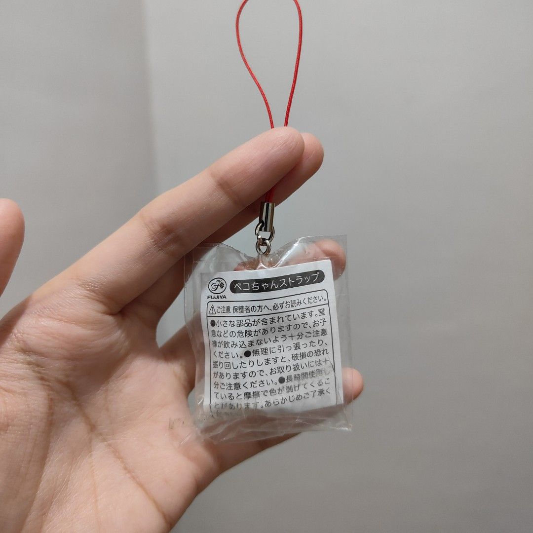 Peko chan figure keychain charm fujiya (Category: Designer & Blind Box Toys) located in Quezon City. Submitted by meadowluvx (Listing ID 1356185645, Image 2). Description: 🥛 read me ˚ੈ♡ ๑ 🍮 ｡⁠☆ ๑ cod option not allowed ๑ please refrain from buying if sensitive to flaws (selling everything as is) ๑ please manage your expectations as these are secondhand items. may also need minimal cleaning. common issues include minimal scratches, paint chips, 