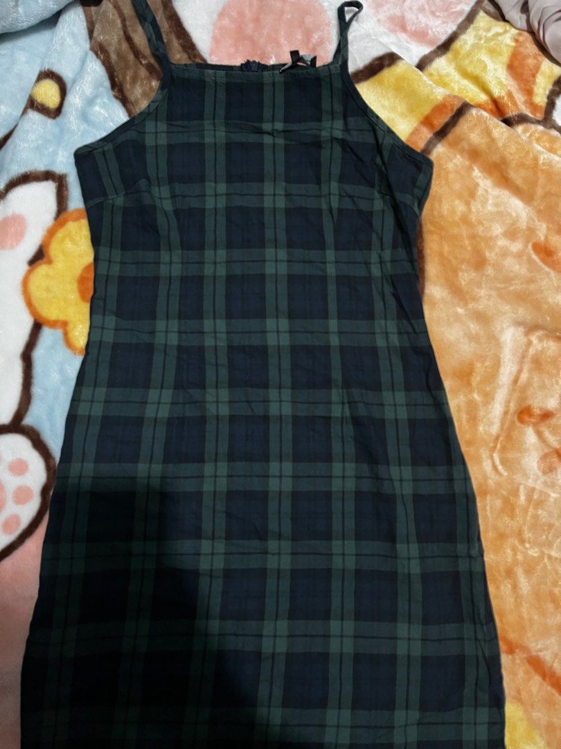 Something Borrowed Green Plaid Halter Dress (Category: Dresses) located in Baguio. Submitted by kaudry_ (Listing ID 1356234677, Image 1). Description: ✅size:S on tag can fit S-semi M ✅mini dress. Measurements in pics ✅a bit loose na bit still super nice RFS: decluttering .