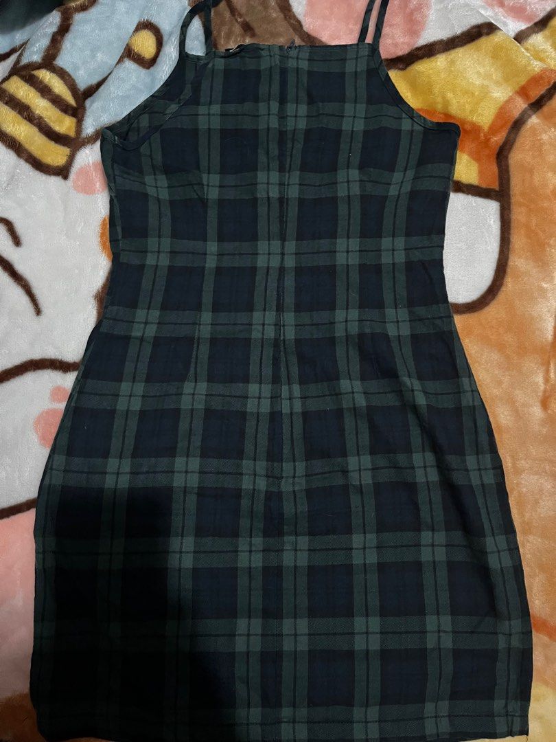 Something Borrowed Green Plaid Halter Dress (Category: Dresses) located in Baguio. Submitted by kaudry_ (Listing ID 1356234677, Image 3). Description: ✅size:S on tag can fit S-semi M ✅mini dress. Measurements in pics ✅a bit loose na bit still super nice RFS: decluttering .