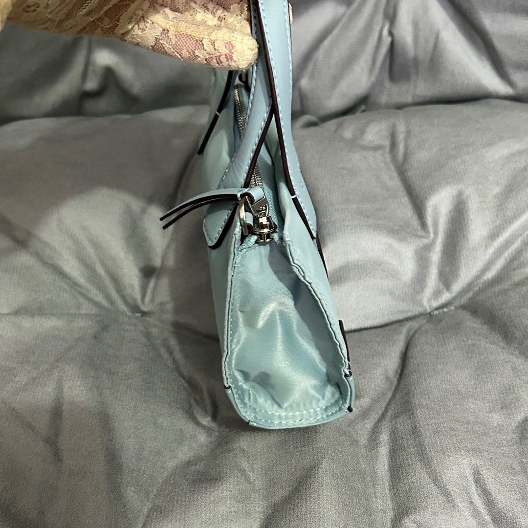 TB - Tory Burch Small Ella Tote (Category: Luxury Bags & Wallets) located in Quezon City. Submitted by luxurybyluci (Listing ID 1356231301, Image 3). Description: Tory Burch Ella Tote Nylon Material Complete with Inclusions Authentic On Hand Brandnew.