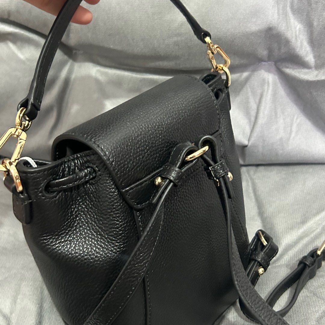 TB - Tory Burch Thea Mini Bucket Pebble Leather Backpack (Category: Luxury Bags & Wallets) located in Cabuyao City. Submitted by luxurybyluci (Listing ID 1356228033, Image 3). Description: Tory Burch Thea Backpack Pebble Leather Authentic On Hand Brandnew .