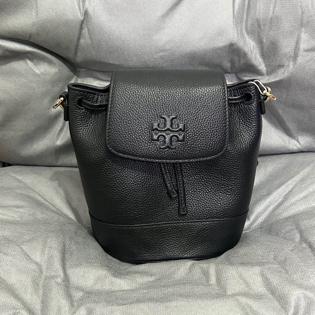 TB - Tory Burch Thea Mini Bucket Pebble Leather Backpack (Category: Luxury Bags & Wallets) located in Cabuyao City. Submitted by luxurybyluci (Listing ID 1356228033, Image 1). Description: Tory Burch Thea Backpack Pebble Leather Authentic On Hand Brandnew .