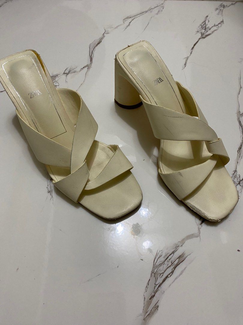 Zara Block Heel Leather Off White Sandals (Category: Heels) located in Taguig. Submitted by prelovedyard_ph (Listing ID 1356191582, Image 3). Description: Original Zara Block Heel Leather Off White Sandals Description from Zara: off white heeled leather sandals with woven straps. Lined block heel. Squared heels and toes. Heel height: 3.2 inches (8.2 cm) Please follow description here for sizing: It’s Zara 35. In cm, it’s 24 cm. Size runs big! I’m