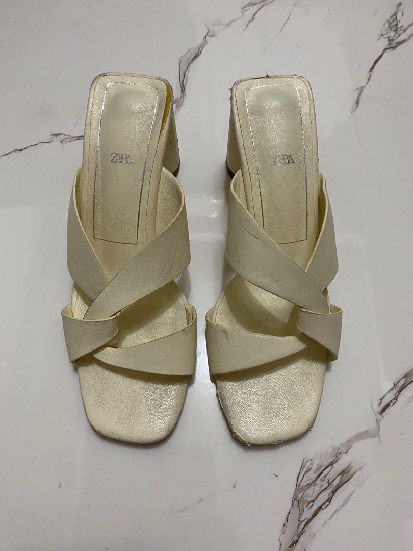 Zara Block Heel Leather Off White Sandals (Category: Heels) located in Taguig. Submitted by prelovedyard_ph (Listing ID 1356191582, Image 2). Description: Original Zara Block Heel Leather Off White Sandals Description from Zara: off white heeled leather sandals with woven straps. Lined block heel. Squared heels and toes. Heel height: 3.2 inches (8.2 cm) Please follow description here for sizing: It’s Zara 35. In cm, it’s 24 cm. Size runs big! I’m
