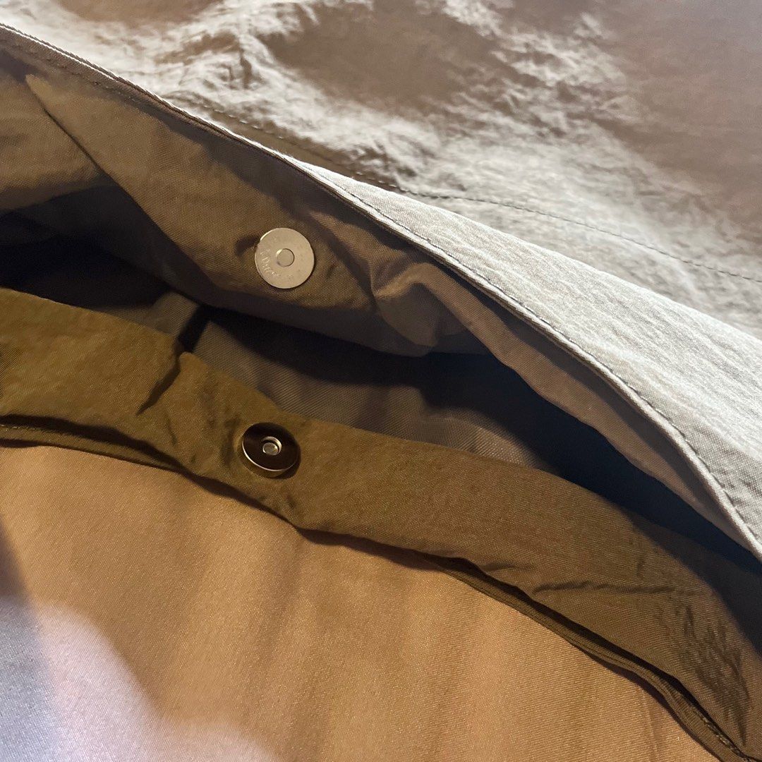 Army Green Hobo Bag (Category: Shoulder Bags) located in Manila. Submitted by gabskkasells (Listing ID 1361106724, Image 3). Description: Never used, bought this online for ₱499 but I wanted one with a zipper. It's actually very spacious (can fit an iPad 9th generation with lots of extra room pa) and looks great with a lot of outfits. • RFS: Wanted one with a zipper (this one comes with a magnetic buckle lang) • No issues • Color: Army green • Di