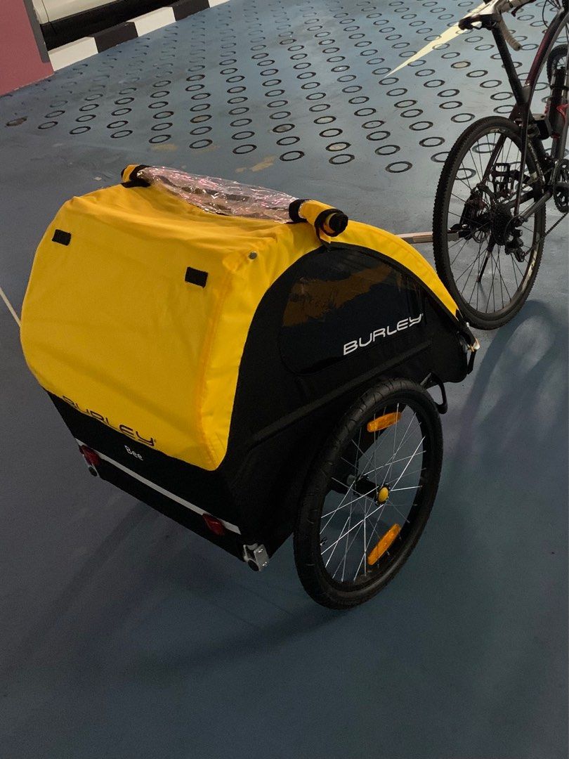 Burley Bee 2 Seater Trailer (Category: Bicycles) located in Singapore. Submitted by mrakhra (Listing ID 1361064026, Image 1). Description: Seating for 2 children UPF 50+ tinted windows and plenty of cargo space. 20” push button wheels for quick removal Tinted side windows Ready To Bike: includes hitch, tow arm and safety flag.Five-point harness system.Full internal aluminum roll cage for protection in an accident. Wheel guards for protection from