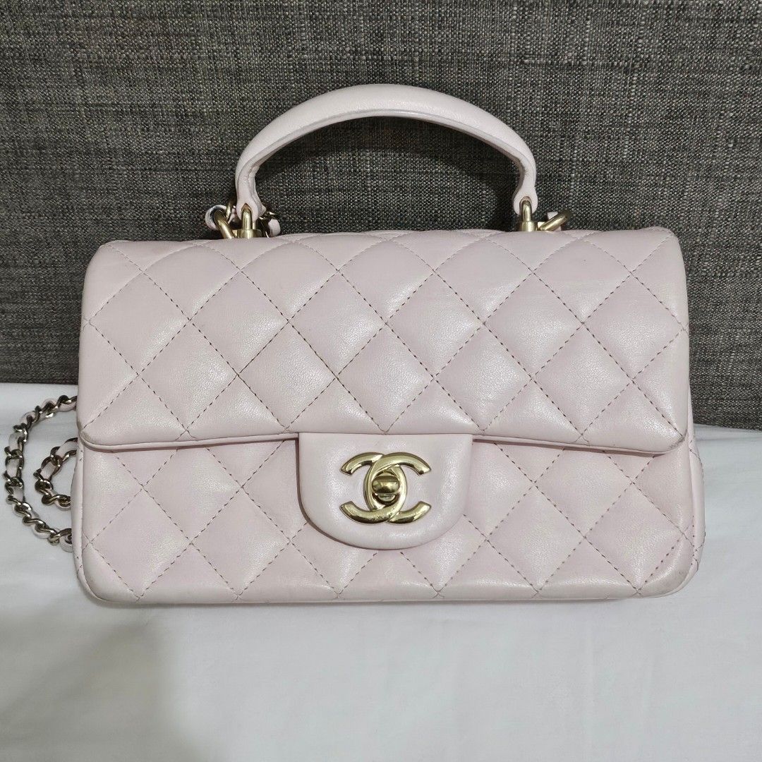 Chanel Mini Rectangular Flap Top Handle (Category: Luxury Bags & Wallets) located in Manila. Submitted by decluttering_account (Listing ID 1361134134, Image 1). Description: Chanel Mini Rectangular Flap with top handle Microchip Purchased March 2022 Inclusions are box, dustbag, and receipt.