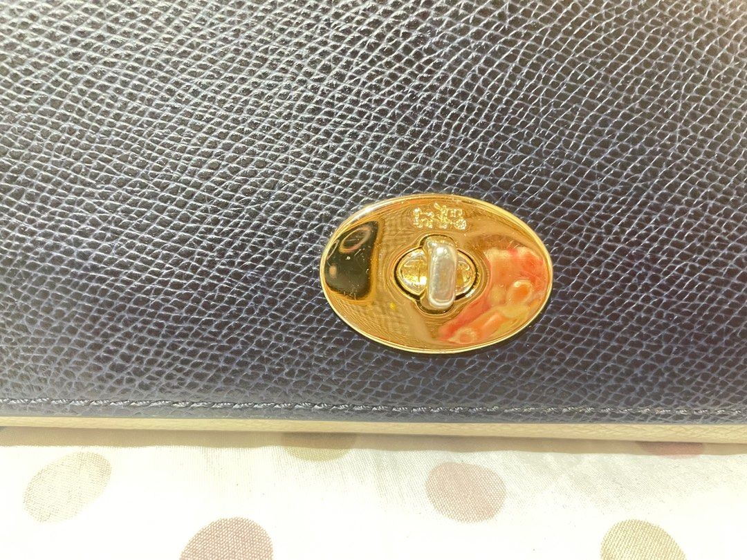 Coach wallet (Category: Luxury Bags & Wallets) located in Pasay City. Submitted by hearty12 (Listing ID 1361190189, Image 2). Description: Coach long wallet. See the picture for reference of flaws. No sling but has sling slot..