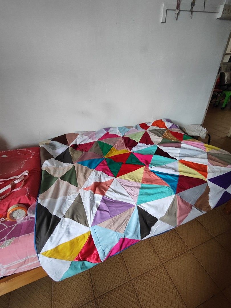 Handmade Patchwork Blanket (Category: Handmade Craft) located in Singapore. Submitted by devilegna0704 (Listing ID 1296239287, Image 2). Description: Handmade by grandma using a traditional sewing machine. Size as shown in photos (approx 155cm x 130cm) Blanket 1: pic 1 - 3 Blanket 2: pic 4-6 Blanket 3: pic 7-9.
