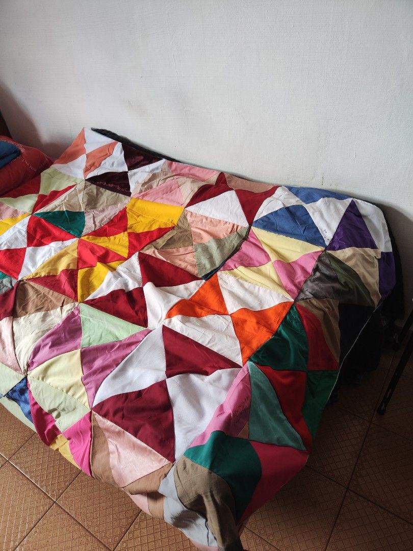 Handmade Patchwork Blanket (Category: Handmade Craft) located in Singapore. Submitted by devilegna0704 (Listing ID 1296239287, Image 8). Description: Handmade by grandma using a traditional sewing machine. Size as shown in photos (approx 155cm x 130cm) Blanket 1: pic 1 - 3 Blanket 2: pic 4-6 Blanket 3: pic 7-9.