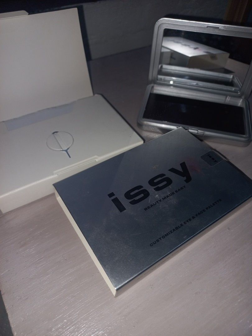 ISSY Regular Pallete with FREE EYESHADOW INSERTS (Category: Makeup) located in Valenzuela. Submitted by laizhanz_07 (Listing ID 1361059550, Image 2). Description: -Original Issy Pallete (may crack, pero nilagyan ng glue) -Walang box -Free eyeshadow inserts from different brands: squad co squadlet serene (repan) -In good condition -Eyeshadows are used from swatches only -Payment first via Gcash -Buyer should shoulder the shipping fee -Negotiable.
