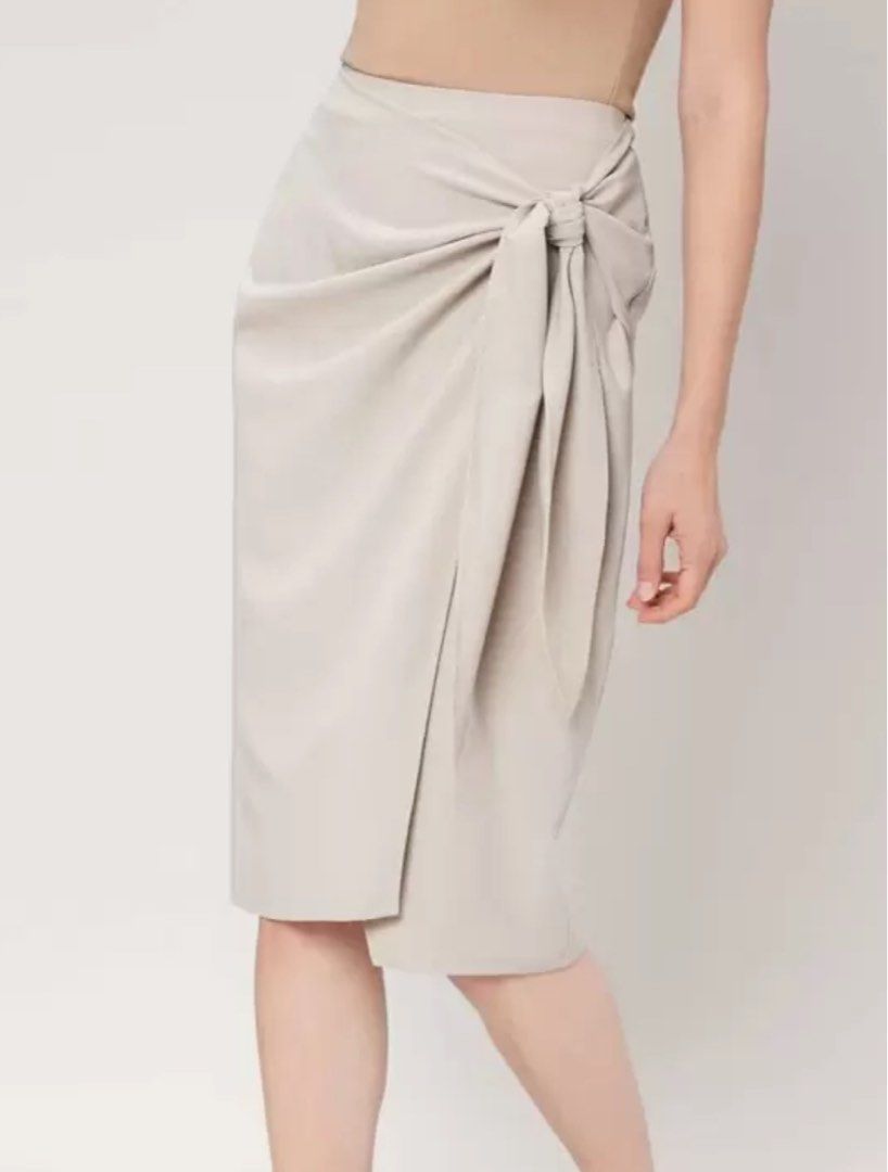 Premium Viscose Wrap Knotted Skirt (Category: Skirts) located in Makati City. Submitted by xianii (Listing ID 1361141191, Image 1). Description: rfs: downsizing my closet it’s still new, i only wore it like twice haha😩 DM if interested! 😊.