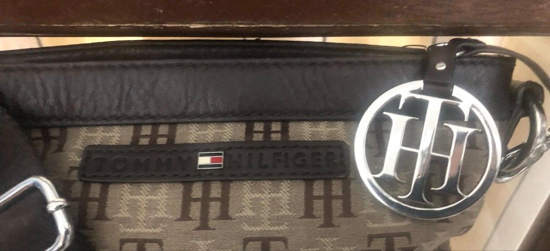 TOMMY HILFIGER Body Bag (Category: Cross-body Bags) located in Imus. Submitted by sharislane (Listing ID 1361067820, Image 3). Description: TOMMY HILFIGER Body Bag 🛞. Original TOMMY HILFIGER Body Bag. 🛞. Measurements Height- 24.5cm Width- 23.5 cm 🛞. With sign of usage..