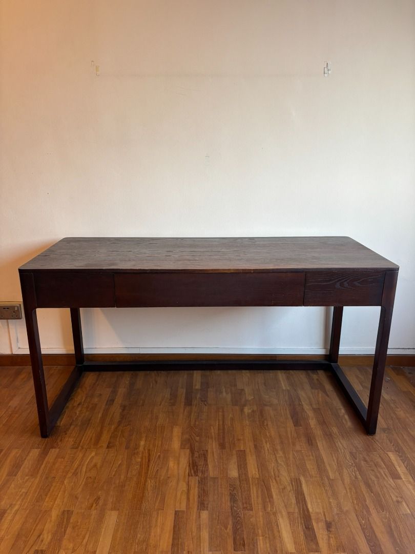 Walnut study table (Category: Tables & Sets) located in Singapore. Submitted by fossiled_freak (Listing ID 1361170152, Image 1). Description: Preloved study table made of sturdy wood Comes with spacious drawer Has signs of wear (water marks and scratches) Length 145cm Depth 50cm Height 75cm Viewing possible after office hours, or on weekends Self pick up or arrange delivery at own expense.