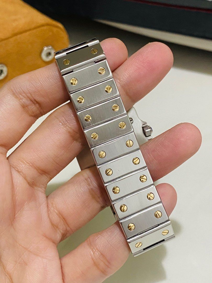 Cartier Santos Automatic (Category: Luxury Watches) located in Baliuag. Submitted by youlovewatches (Listing ID 1361254548, Image 2). Description: Cartier Santos Carree 248,000 Php Automatic Movement 2tone (18k & SS) Case: 29x41mm (Mens/Unisex) Continuous Strap (No clasp) Wrist: Approx 16.5cm-17cm Guaranteed Authentic Open for same day authentication Lay-away available All Original 9/10 Well Maintained Cartier Santos Model Set with: Box, Manual, 