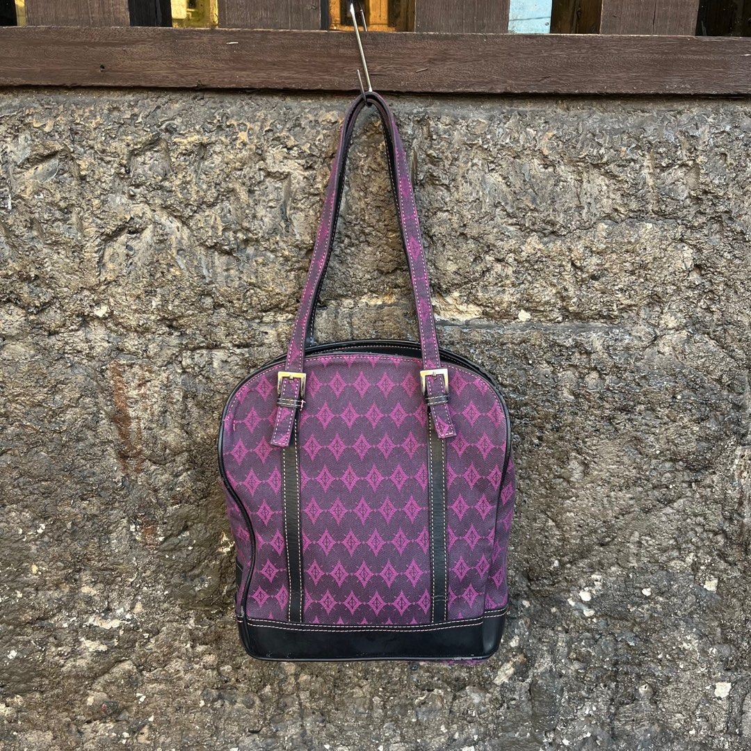 Kenzo Shoulder Bag (Category: Luxury Bags & Wallets) located in Marikina City. Submitted by wayupcollective (Listing ID 1361287685, Image 1). Description: Kenzo Shoulder Bag Good condition No flaws on canvas Flaws: crack leathers, piping Measurement Length: 10” Width: 10” Depth: 4” Handle Drop: 8” .