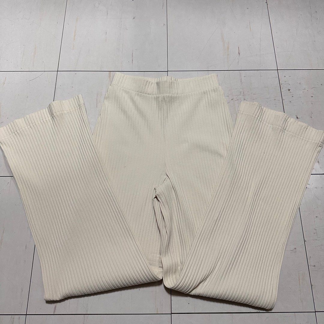 MONKI Ribbed Pants Bundle (Category: Other Bottoms) located in Manila. Submitted by catchim (Listing ID 1361207166, Image 3). Description: Preloved pants 🖤 GOOD CONDITION. Minor issues •Beige pants: some stains but barely noticeable (see pictures for reference) •Black pants: tear on the waist band (see pictures for reference) Size XS on tag L: 40” W: 12” Note: measurements are done laid flat PM for more details!.