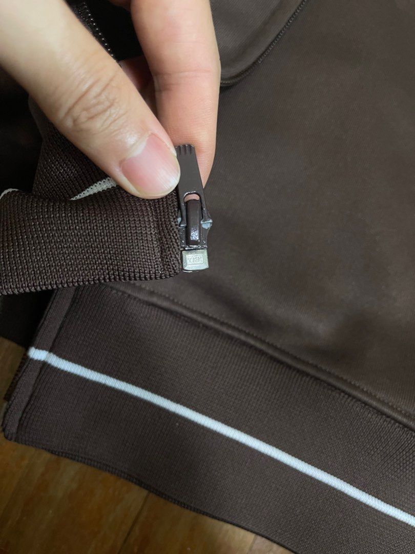 Vintage Adidas Jacket (Category: Coats, Jackets and Outerwear) located in Singapore. Submitted by julian_yeo_yy (Listing ID 1361201840, Image 3). Description: Authentic chocolate Adidas jacket for sale Condition 9.5/10, only slight yellowing on the tag, basically new condition especially considering the age. Letting go as sadly too small for me.