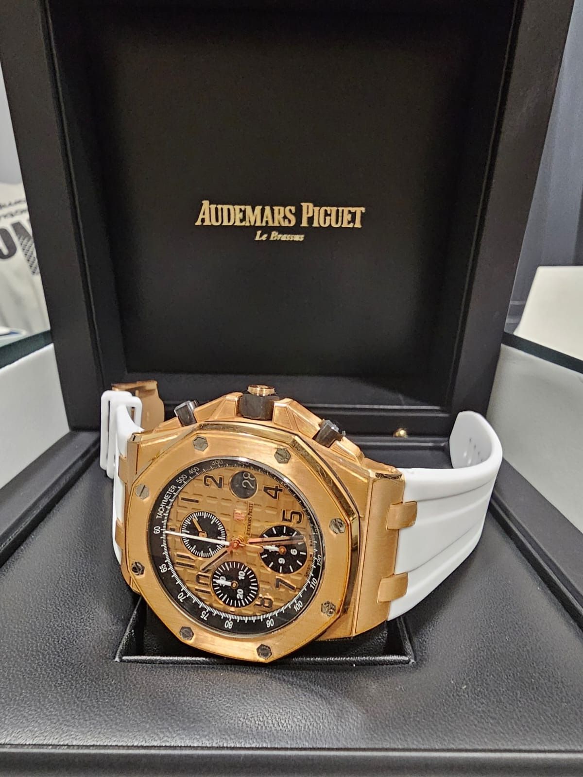 Audemars Piguet Royal Oak Offshore 42mm 26470OR.OO.A002CR.01 AP Honeybee (Category: Watches) located in Singapore. Submitted by realtor.leslie.t (Listing ID 1356347144, Image 3). Description: Brand: Audemars Piguet Family: Royal Oak Offshore Reference: 26470OR.OO.A002CR.01 Name: Royal Oak Offshore 26470 Pink Gold / Black / rubber strap Movement: Audemars Piguet caliber AP 3126 / 3840 Produced: 2017 Full Set and c/w 3rd party White Strap. Welcome 