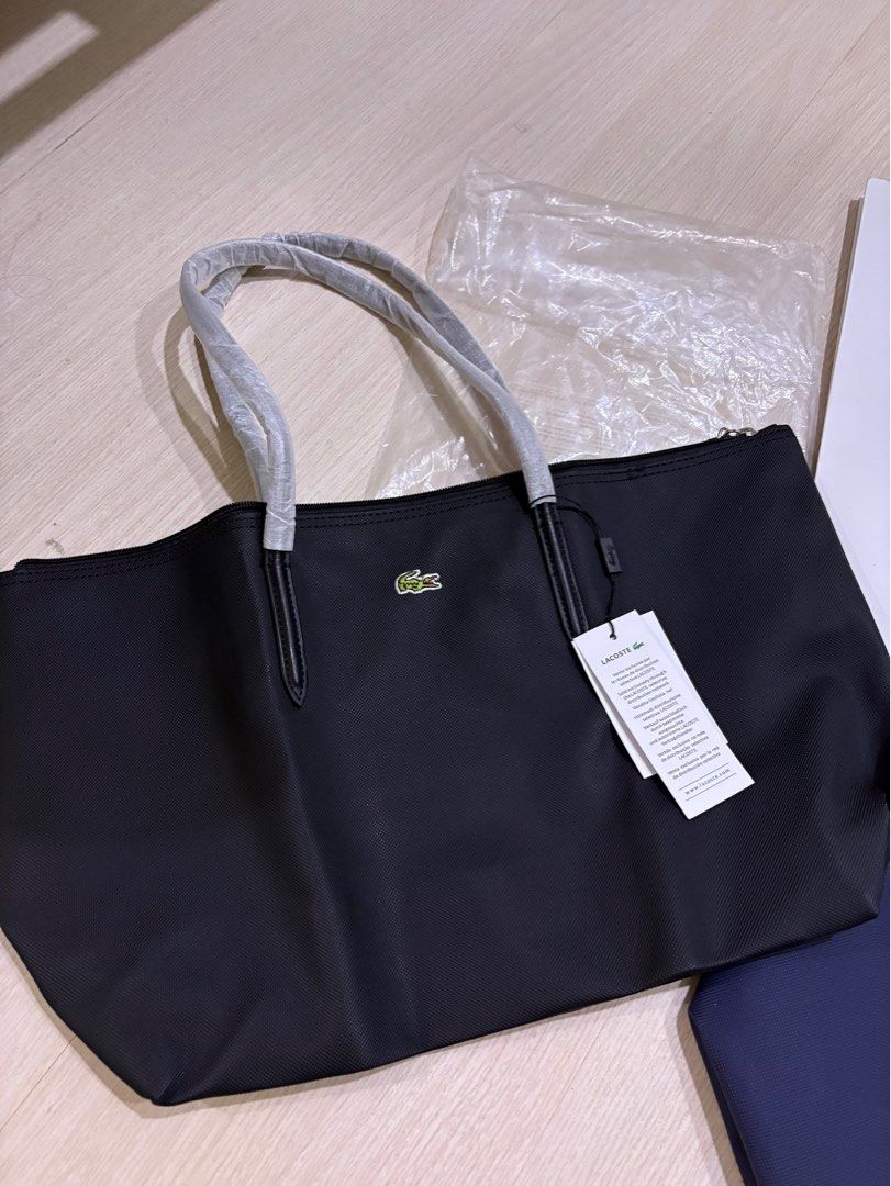 Authentic Lacoste tote bag (Category: Tote Bags) located in Del Monte. Submitted by summer_1988 (Listing ID 1346479177, Image 2). Description: Brand new🐊Lacoste tote bag Made in France 🇫🇷 Inclusions: ✅Original tags and packaging ✈️Same day delivery within Metro Manila ✈️2 day shipping for Provincial 📍My location: Quezon City roosevelt 💠Available in navy blue and black .