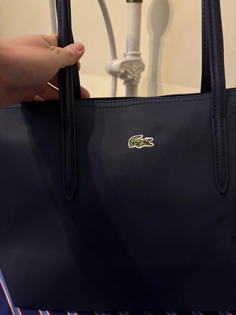 Authentic Lacoste tote bag (Category: Tote Bags) located in Del Monte. Submitted by summer_1988 (Listing ID 1346479177, Image 3). Description: Brand new🐊Lacoste tote bag Made in France 🇫🇷 Inclusions: ✅Original tags and packaging ✈️Same day delivery within Metro Manila ✈️2 day shipping for Provincial 📍My location: Quezon City roosevelt 💠Available in navy blue and black .