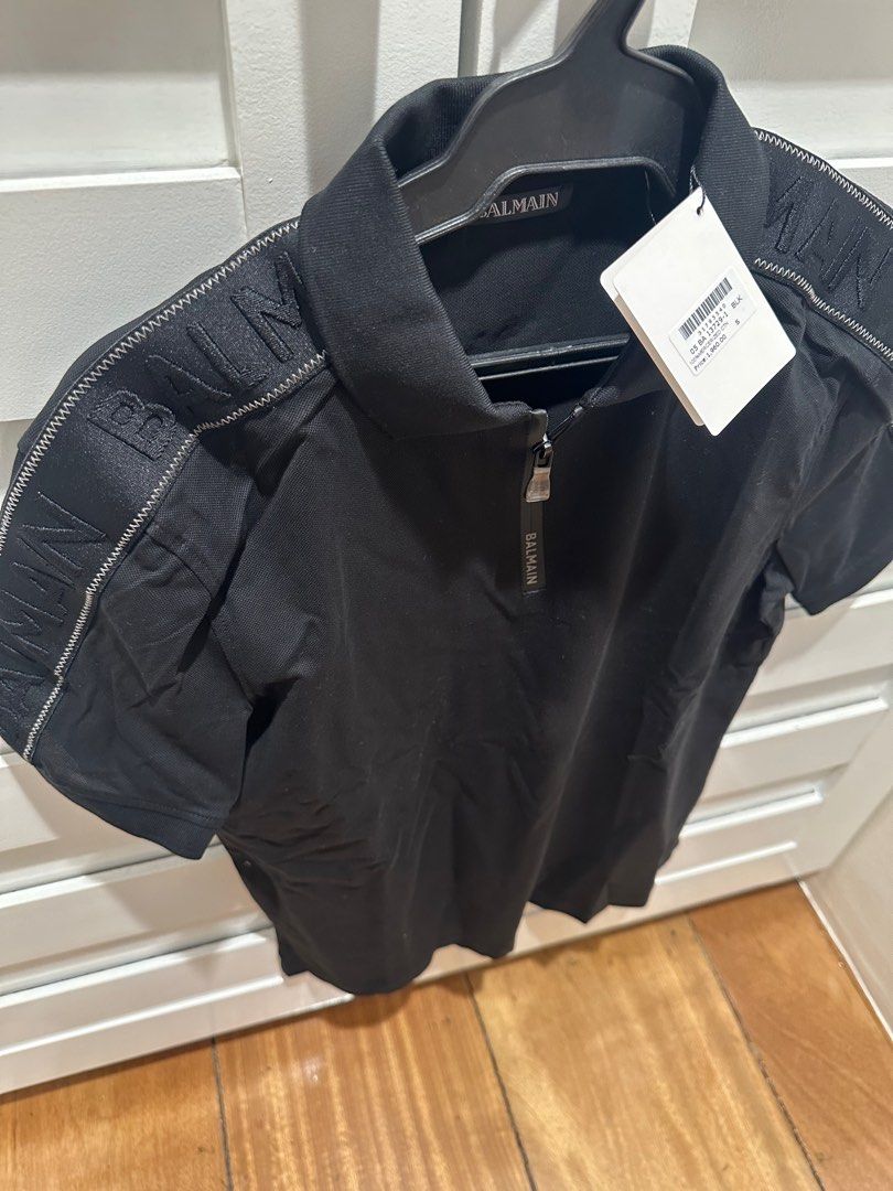Balmain polo shirt (Category: Tshirts & Polo Shirts ) located in Quezon City. Submitted by chamndz (Listing ID 1356275502, Image 3). Description: Medium Bought in dubai 100000% authentic Comes with paperbag, plastic, tag (complete inclusions) Commonwealth area RFS: too big.