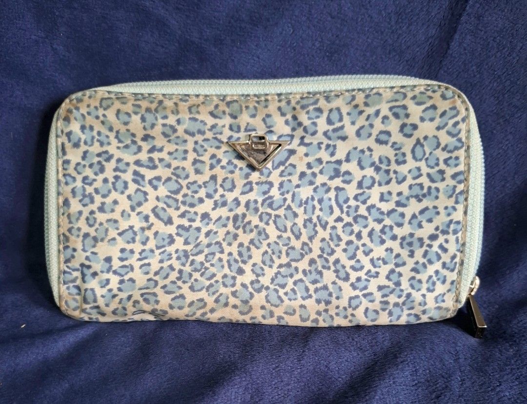 Bottega Veneta zippy wallet (Category: Luxury Bags & Wallets) located in Don Carlos. Submitted by PphiXi_Finds (Listing ID 1356393551, Image 1). Description: Authentic vintage leopard design zippy wallet. The only issue is that it needs cleaning. leather and cloth material. MOP: Gcash Courier: Flash Express *** NO RUSH SHIPPING PLEASE.