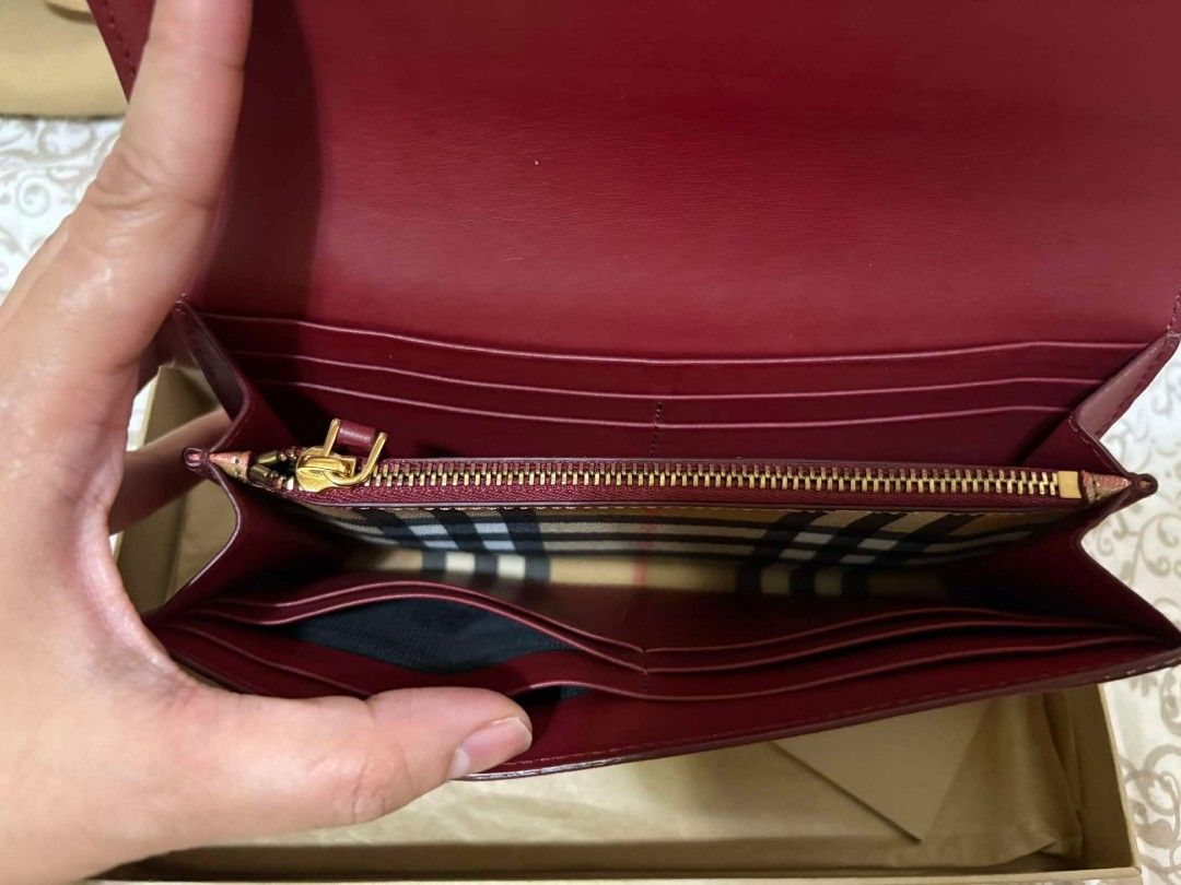 Burberry Halton Long Wallet (Category: Luxury Bags & Wallets) located in Manila. Submitted by magnoliab67495 (Listing ID 1356432334, Image 2). Description: Authentic Burberry Long Wallet Leather with complete inclusions Box Dust Bag Care card Tag slightly used Negotiable.