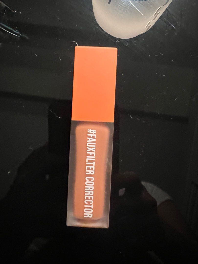 Huda Beauty Faux Filter Corrector in Mango (Category: Makeup) located in Quezon City. Submitted by ayramaem (Listing ID 1356430503, Image 2). Description: Rfs: wrong shade Used only twice, bought in sephora malaysia. No box included ;((.