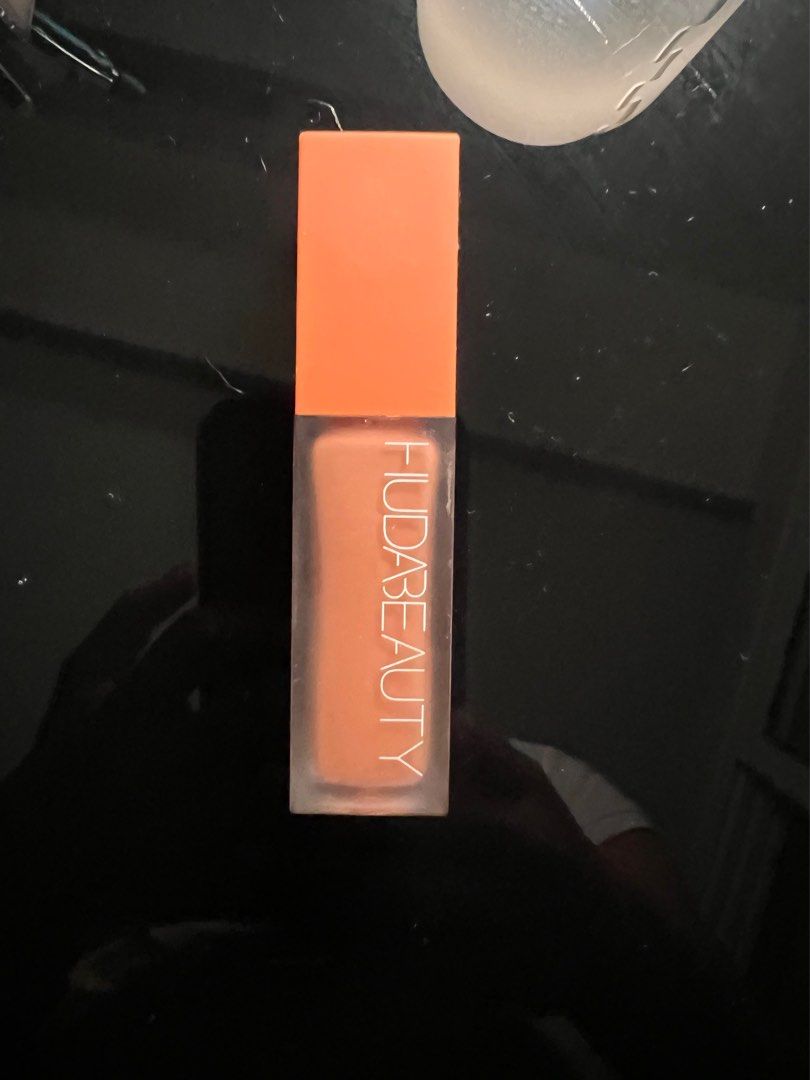 Huda Beauty Faux Filter Corrector in Mango (Category: Makeup) located in Quezon City. Submitted by ayramaem (Listing ID 1356430503, Image 1). Description: Rfs: wrong shade Used only twice, bought in sephora malaysia. No box included ;((.