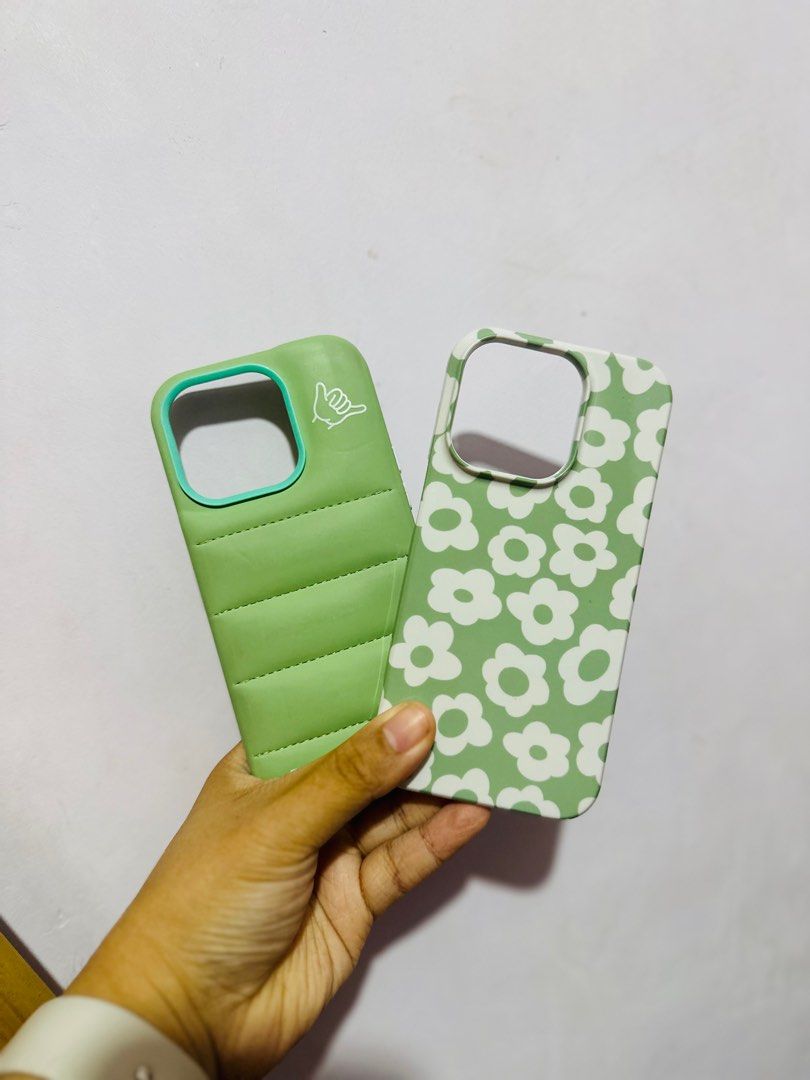 Iphone 14 Pro Funiki and Hard Case Set (Category: Cases & Sleeves) located in Taguig. Submitted by yhelmin (Listing ID 1356304342, Image 1). Description: ✨Preloved 14 Pro cases ✨Get both the 2 cases for PHP 500 ✨Funiki Case is a matte matcha colored puffed case. Fit is good on this one. ✨Hard Case is cute slim case. Fit is a little loose on this one. ✨Can send more pics in message 💵 Bank Transfer or Gcash 🛵 Grab or Lalamove only please 🙏🏼 .