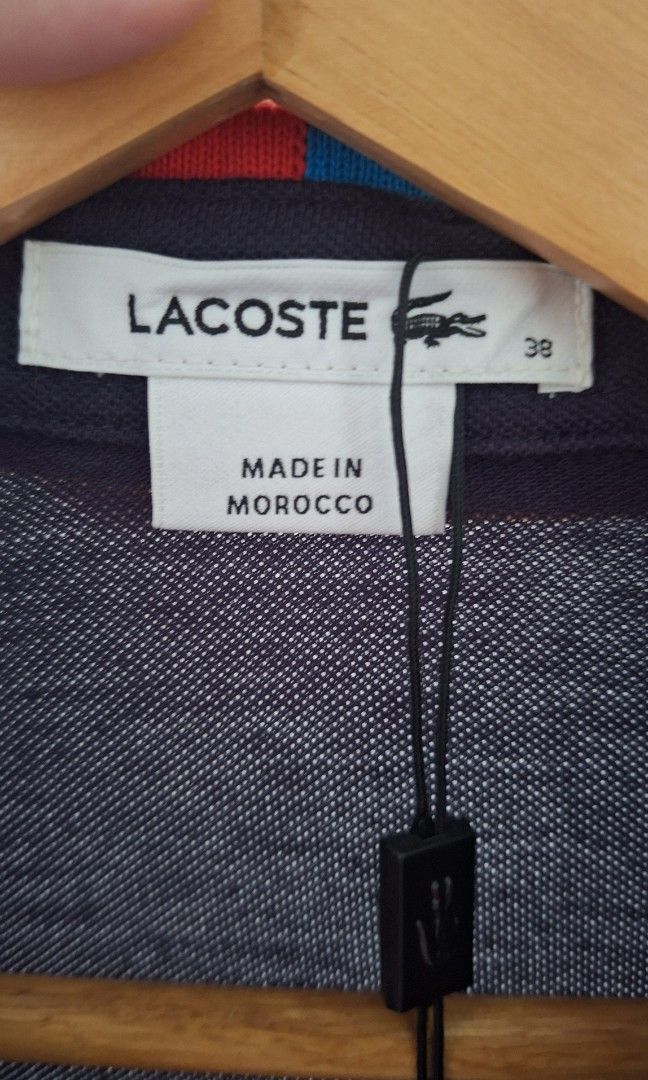 Orig Lacoste Polo Shirt (Category: Blouses) located in Manila. Submitted by decluttering.princess (Listing ID 1356350387, Image 3). Description: original brand new loc- sta mesa Manila.
