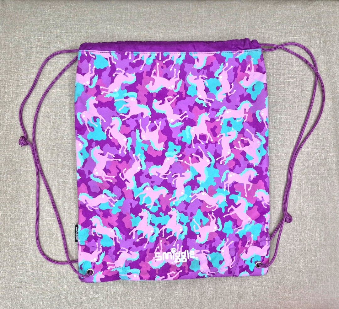 Smiggle Unicorn Drawstring Bag (Category: Babies & Kids Fashion) located in Quezon City. Submitted by akcstuff (Listing ID 1356257063, Image 1). Description: signs of usage (barely noticeable).