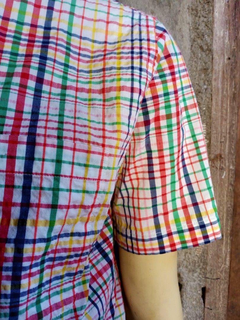Uniqlo Polo Checkered for Men (Category: Tshirts & Polo Shirts ) located in Taguig. Submitted by Wacofancy (Listing ID 1354886616, Image 3). Description: Good as new Color may vary due to light. Size on tag: XL Actual Size: Width 22 inch armpit to armpit. Length 32 inch from shoulder to bottom..