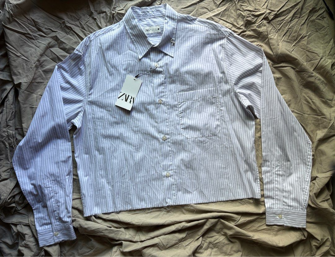 ZARA Button-down Long-sleeve Crop Shirt with Piercing (Category: Tshirts & Polo Shirts ) located in Mandaluyong City. Submitted by offlegitstore (Listing ID 1356314745, Image 2). Description: .