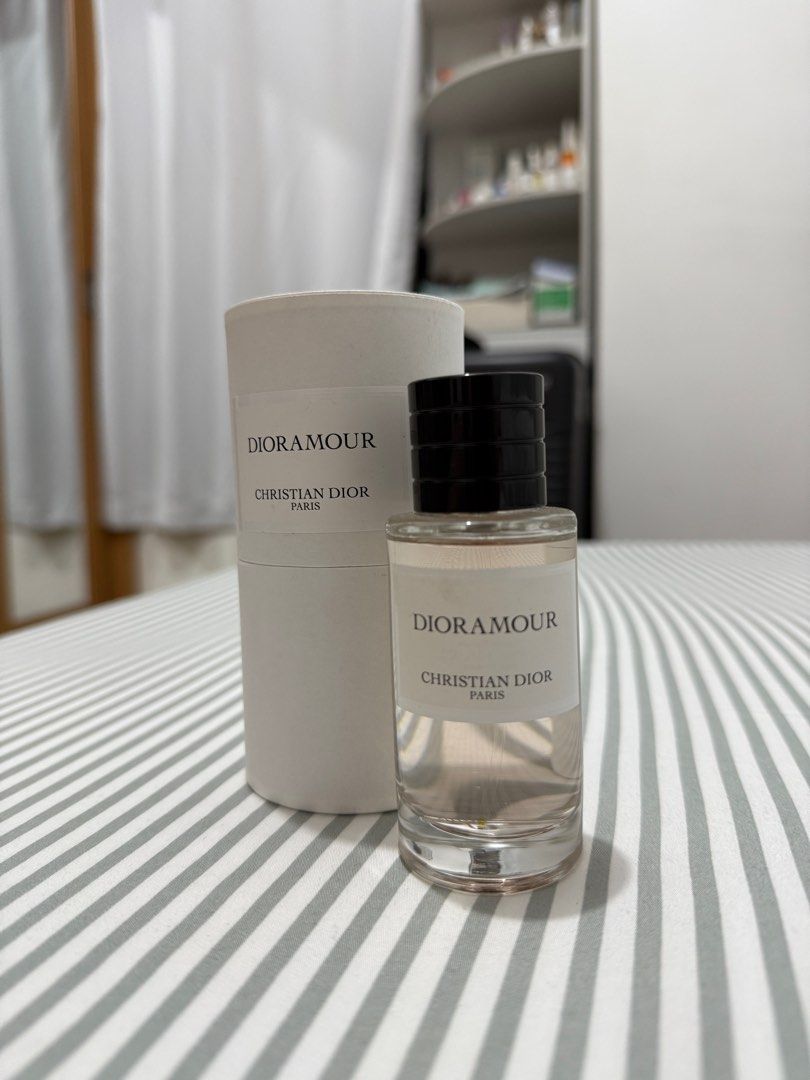 Christian Dior Dioramour Perfume (Category: Fragrance & Deodorants) located in Taguig. Submitted by sls08 (Listing ID 1356551443, Image 3). Description: Almost new Dior perfume. Bought early 2024 in SM Aura, about 98% remaining. With authentic Dior paper bag it came with. I will shoulder sf. RFS: have too many perfumes and I only used this for events.