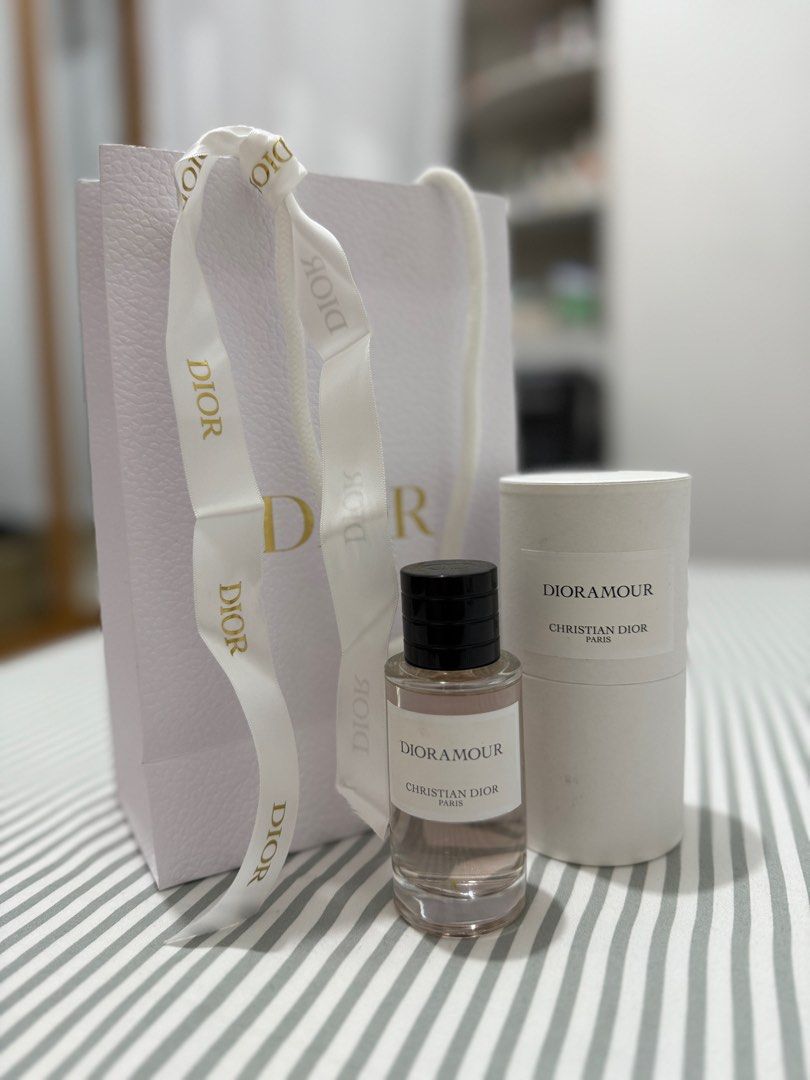 Christian Dior Dioramour Perfume (Category: Fragrance & Deodorants) located in Taguig. Submitted by sls08 (Listing ID 1356551443, Image 1). Description: Almost new Dior perfume. Bought early 2024 in SM Aura, about 98% remaining. With authentic Dior paper bag it came with. I will shoulder sf. RFS: have too many perfumes and I only used this for events.