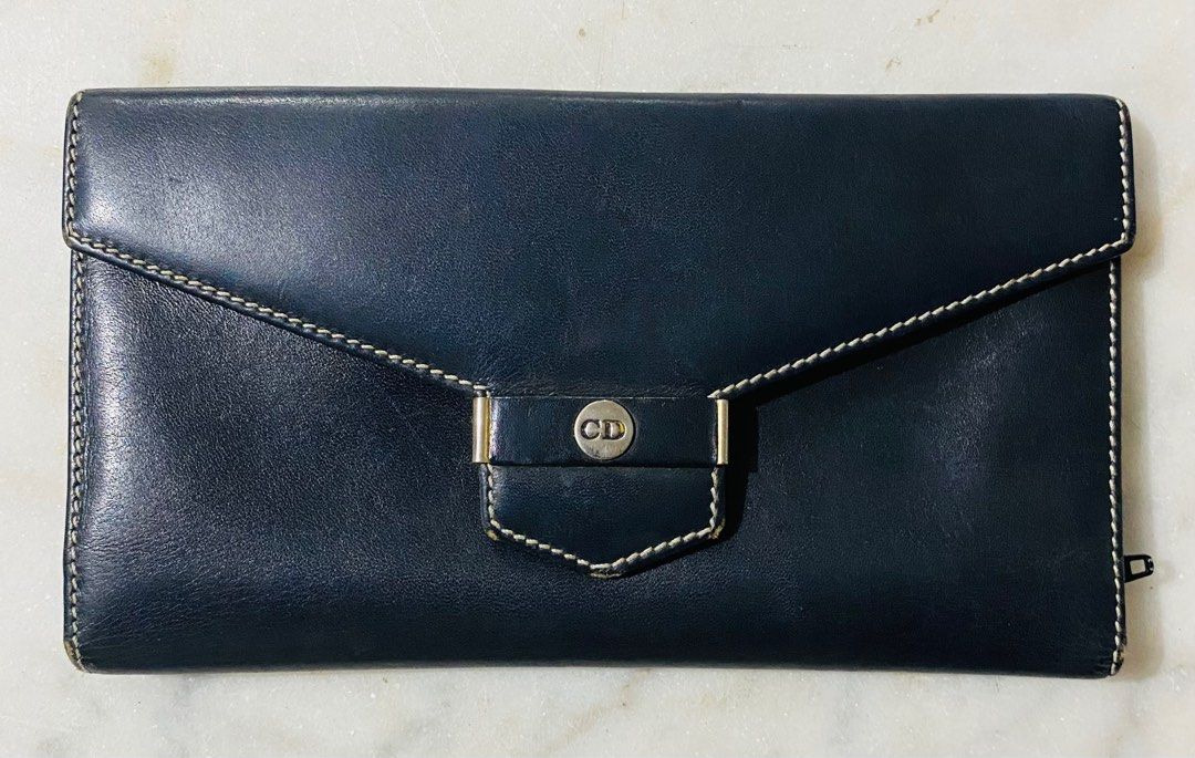 Christian Dior Wallet (Category: Luxury Bags & Wallets) located in Rizal. Submitted by symonstephenjapansurplus (Listing ID 1356510125, Image 1). Description: Christian Dior Wallet Vintage Made in Spain Symon & Stephen Japan Surplus.