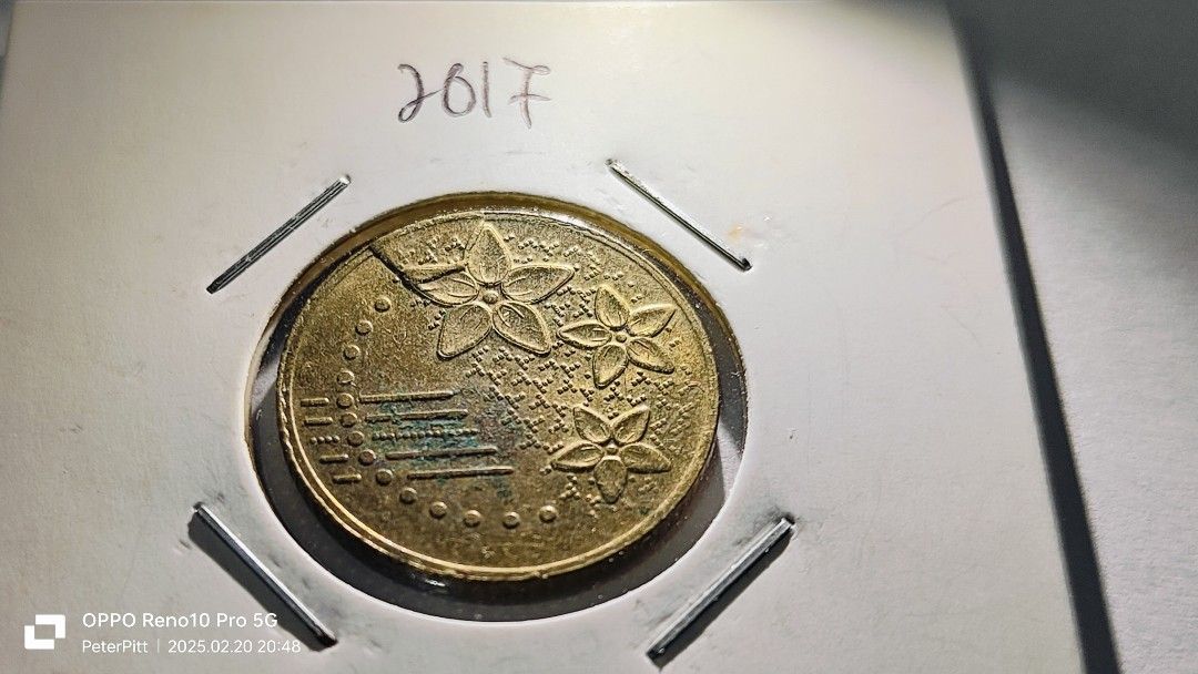 Error coin (Category: Currency) located in Bau. Submitted by pitt1984 (Listing ID 1356574730, Image 1). Description: retained die crack.