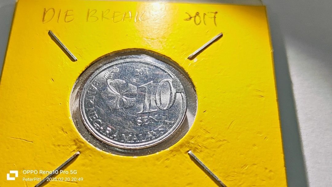 Error coin (Category: Currency) located in Bau. Submitted by pitt1984 (Listing ID 1356576219, Image 1). Description: Die break.