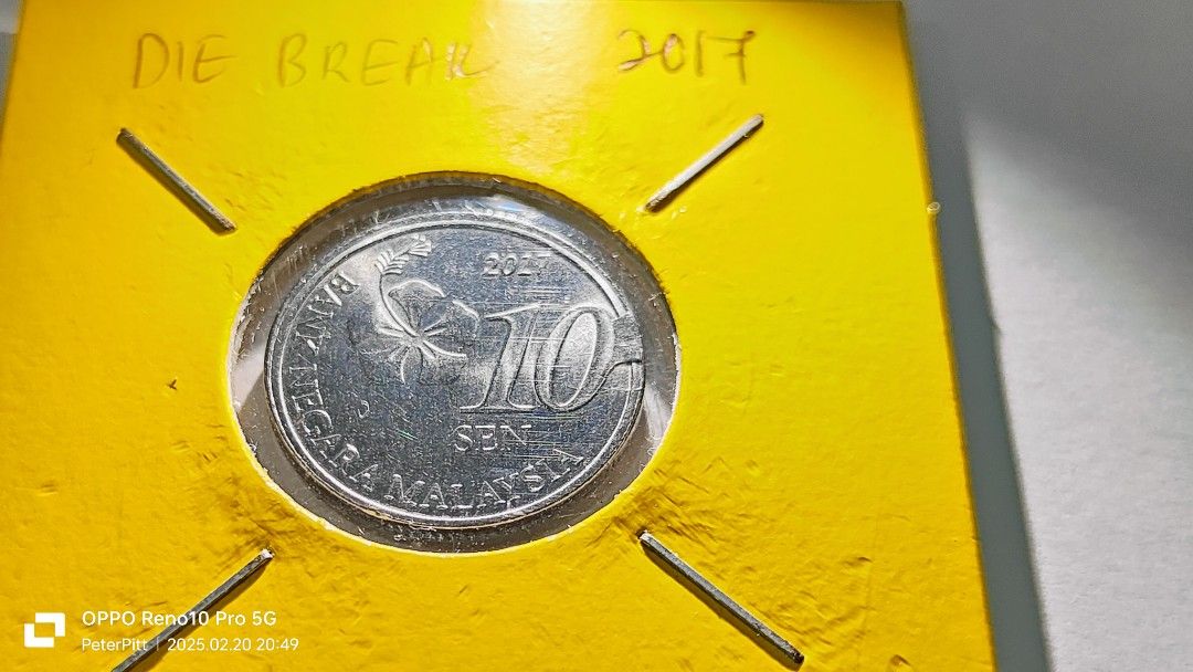 Error coin (Category: Currency) located in Bau. Submitted by pitt1984 (Listing ID 1356576388, Image 1). Description: Die break.