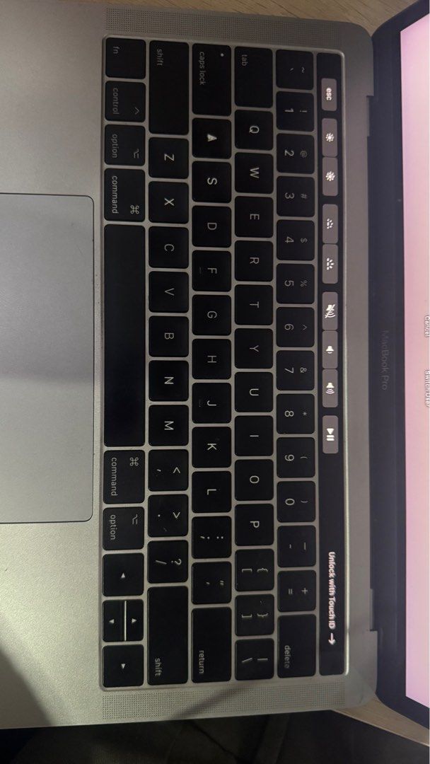 MacBook Pro 13inch 2017 with touch bar (Category: Laptops & Notebooks) located in Quezon City. Submitted by __agn (Listing ID 1356619665, Image 3). Description: Price is negotiable. No charger brick, just USB C cable. .