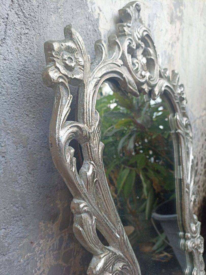 Wall Mirror Baroque Art Style (Category: Mirrors) located in Marikina City. Submitted by jrssags (Listing ID 1356517899, Image 3). Description: Wall Mirror – Baroque Art Style (Silver Finish) Dimensions: 63 cm (Length) x 40 cm (Width) Color: Silver Material: Mixed metal (Most parts are non-magnetic, edges are slightly magnetic) Origin: From my grandmother’s house Location: Barangay Concepcion Uno, Marikina City Shipping: Buyer shoulders the shipp