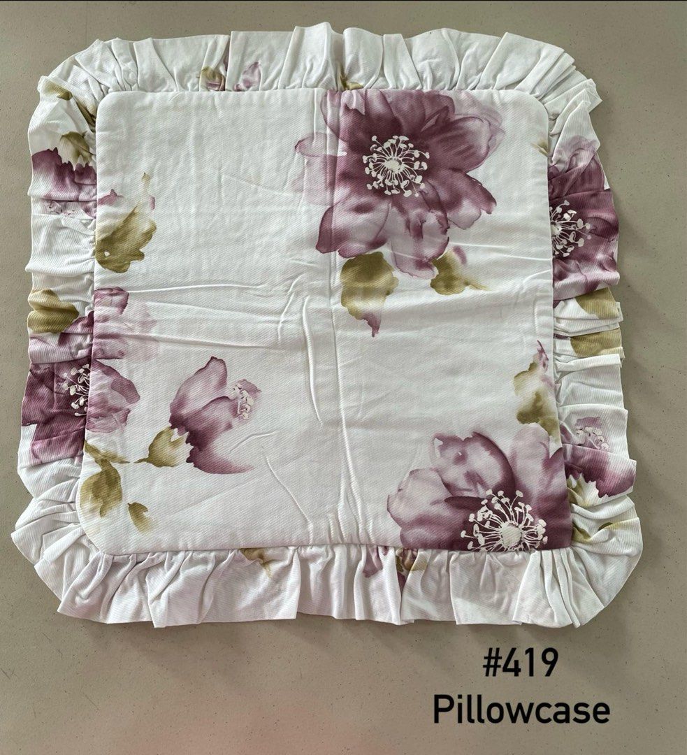 White with Purple Flowers Pillowcase (Category: Cushions & Throws) located in Quezon City. Submitted by meggoquingco (Listing ID 1356508149, Image 1). Description: .