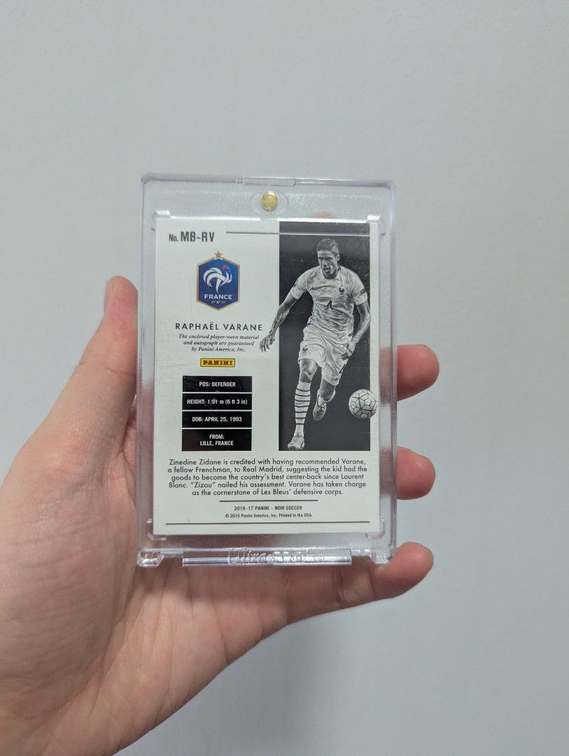 2016-17 Panini Noir Soccer RAPHAEL VARANE Oncard Patch Auto #/25 (France, Manchester United, Real Madrid) (Category: Raw Cards) located in Singapore. Submitted by shinji.collector (Listing ID 1356682841, Image 2). Description: 2016-17 Panini Noir Soccer RAPHAEL VARANE Oncard Patch Auto #/25 FREE TRACKED MAIL.