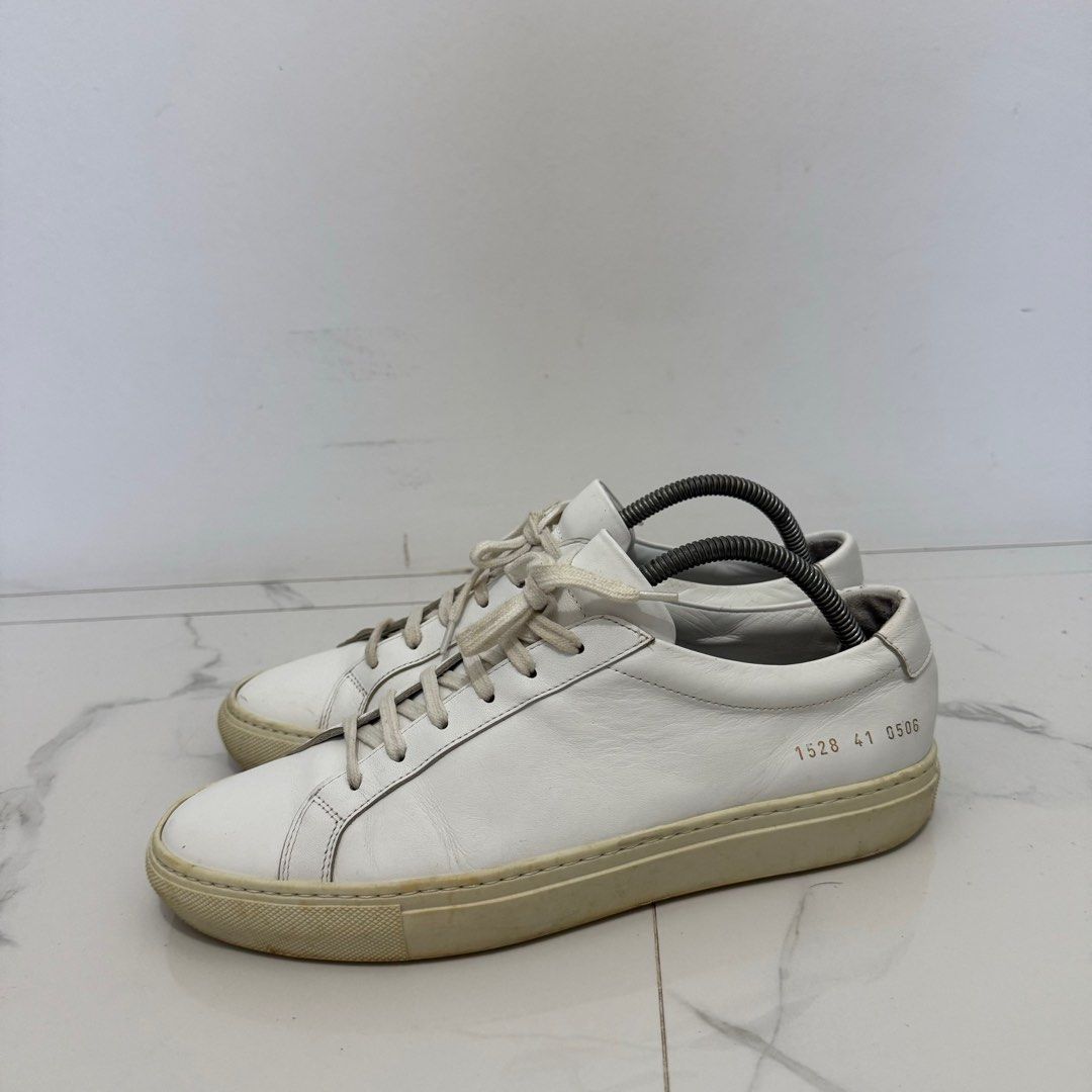 Common Projects Achilles White (Category: Sneakers) located in Tanauan. Submitted by flexingthriftsph (Listing ID 1356713353, Image 2). Description: Common Projects Achilles White Size 41 Pair only No box Used Issues - soles drags and minimal scratches 8/10 condition -3,500.00.