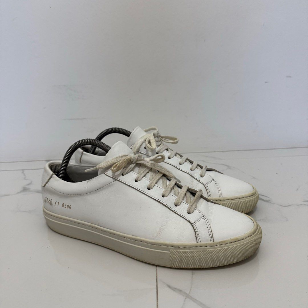 Common Projects Achilles White (Category: Sneakers) located in Tanauan. Submitted by flexingthriftsph (Listing ID 1356713353, Image 1). Description: Common Projects Achilles White Size 41 Pair only No box Used Issues - soles drags and minimal scratches 8/10 condition -3,500.00.